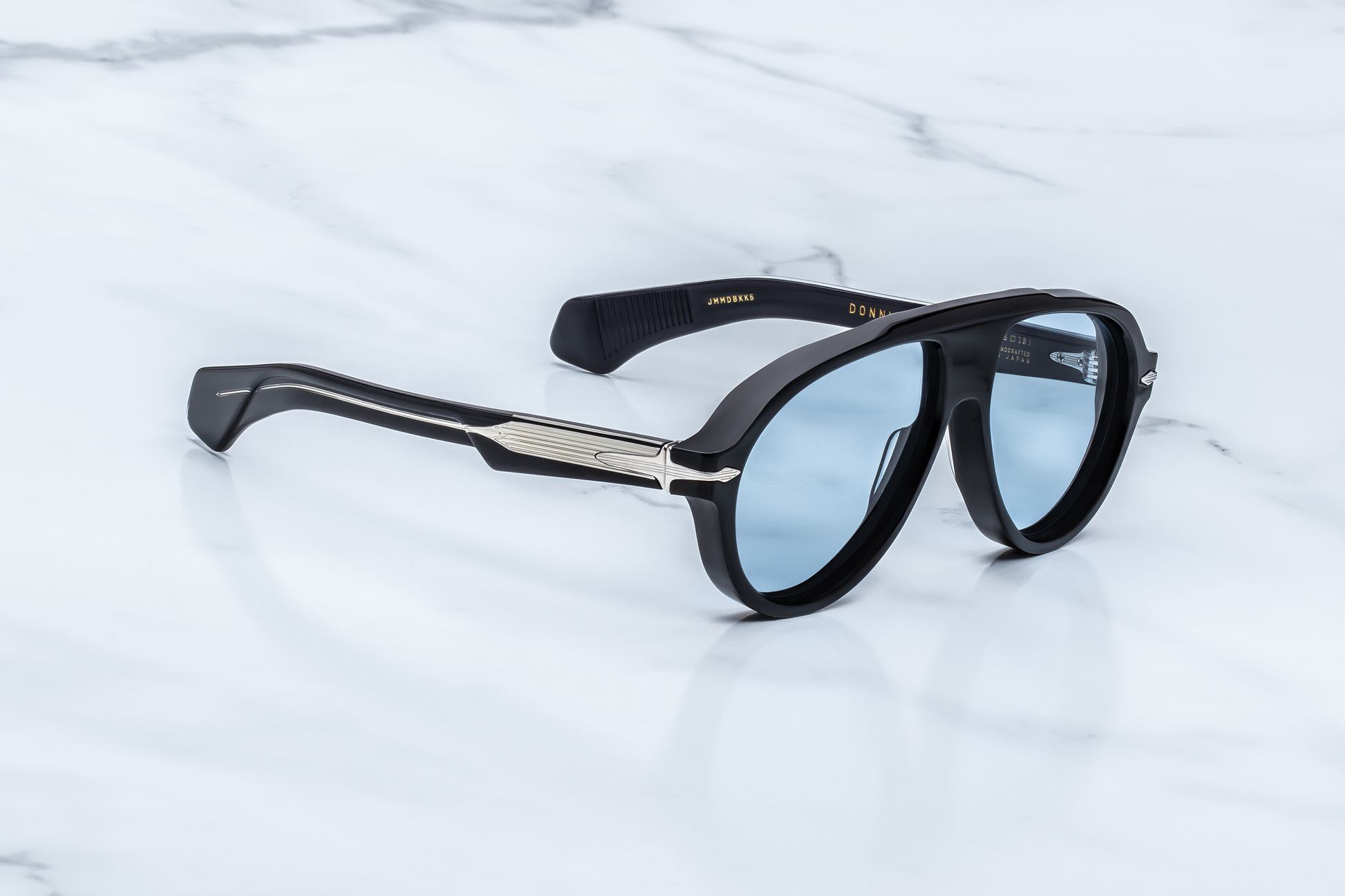 Jacques Marie Mage Donnybrooke Obscure sunglasses three-quarter angle showing oversized aviator silhouette and luxury Japanese acetate – available at WINK Optometrists.