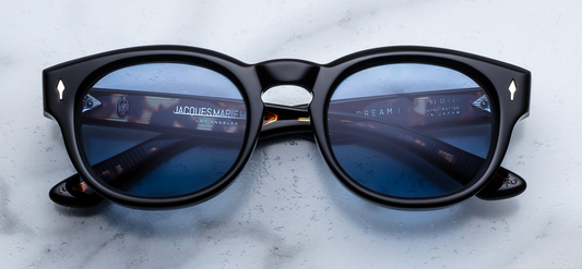 Jacques Marie Mage Dr. Dream Noir — classic mid-century John & Yoko design in polished black acetate with sterling silver arrowhead front pins, as seen on WINK