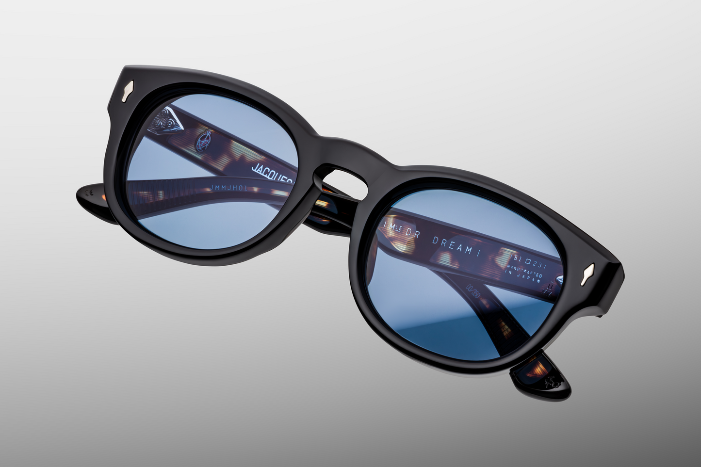 Top-down view of Dr. Dream Noir — keyhole bridge, softly sloping brow, and smoothly bevelled edges on the polished black frame