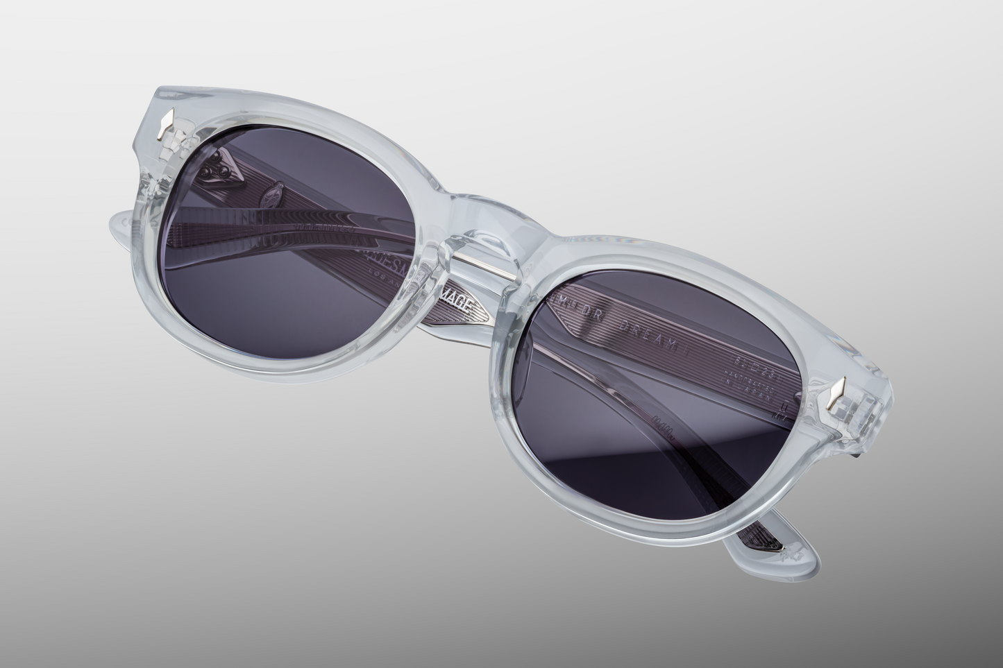 Close-up on the Dr. Dream Sulfur hinge — silver 7‑barrel tension-secured hinge with engraved rivets, set into polished sulfur acetate