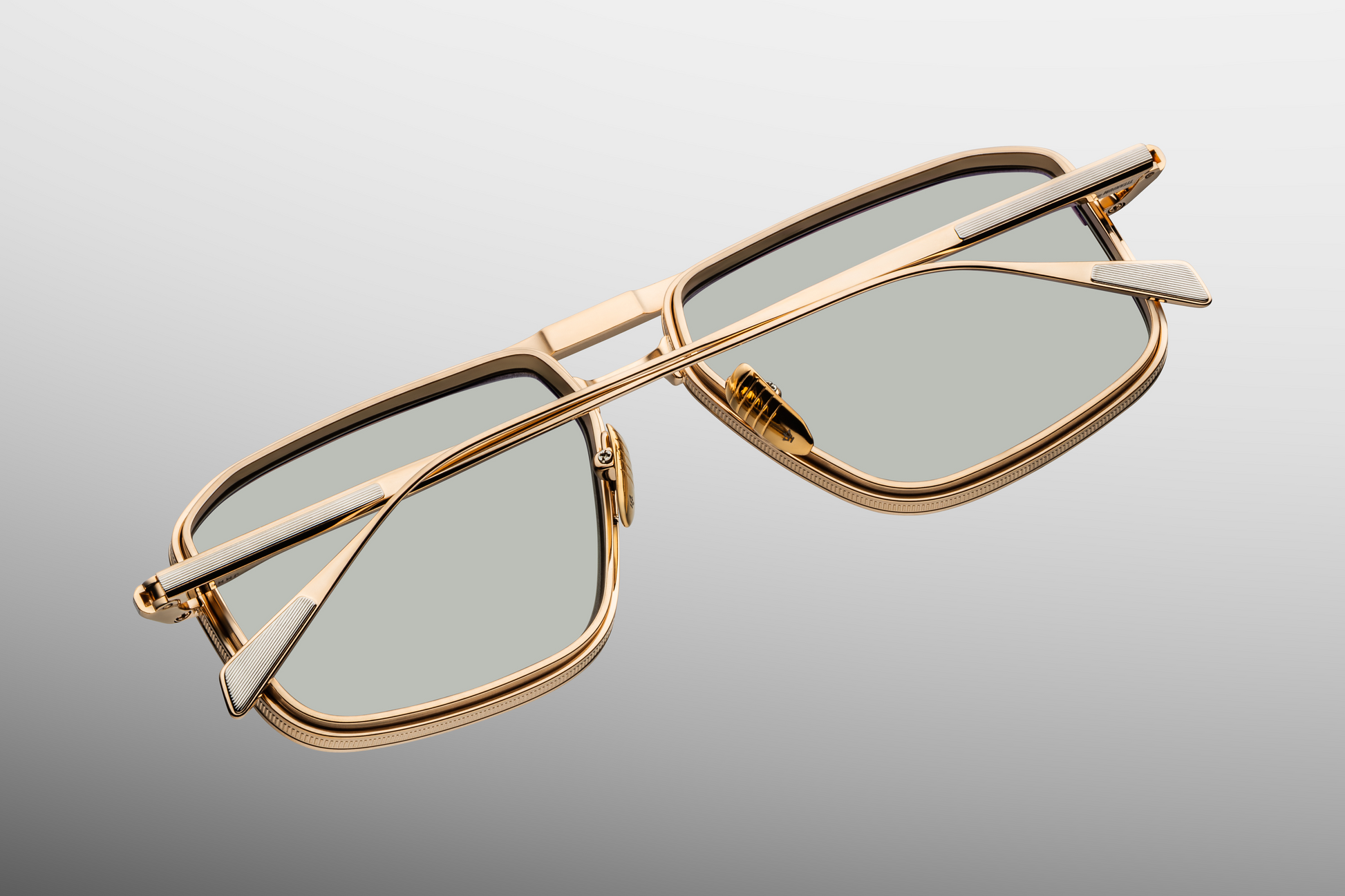 Back view of Jacques Marie Mage Earl Altan sunglasses: exposed titanium frame with engraved logo nose pads, dual-tone brow and temple detailing, and mist CR39 lenses. Limited edition of 500 pieces, handcrafted in Japan