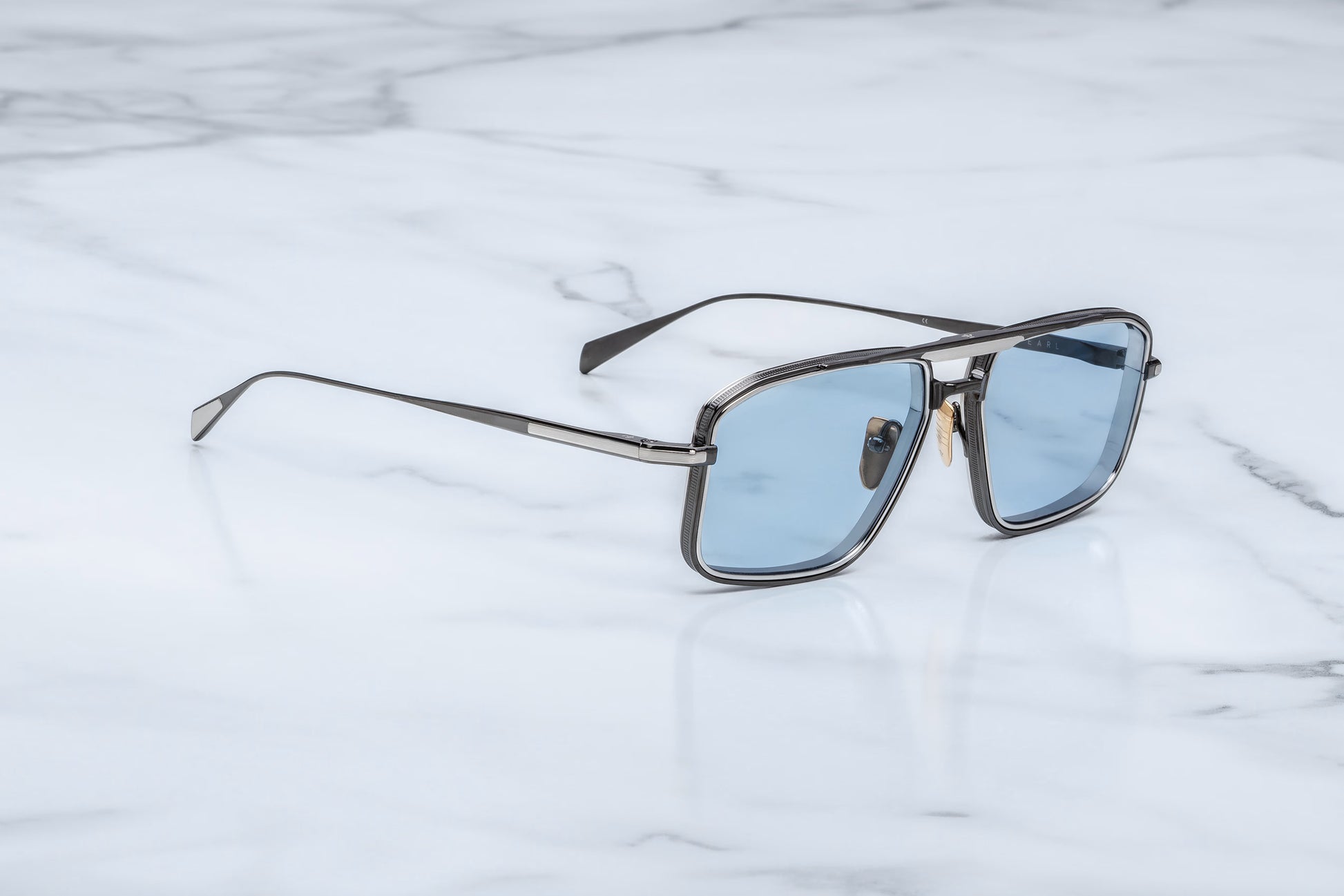 Jacques Marie Mage Earl Antique Silver sunglasses side profile showing beta titanium temples, engraved detailing and handcrafted luxury construction