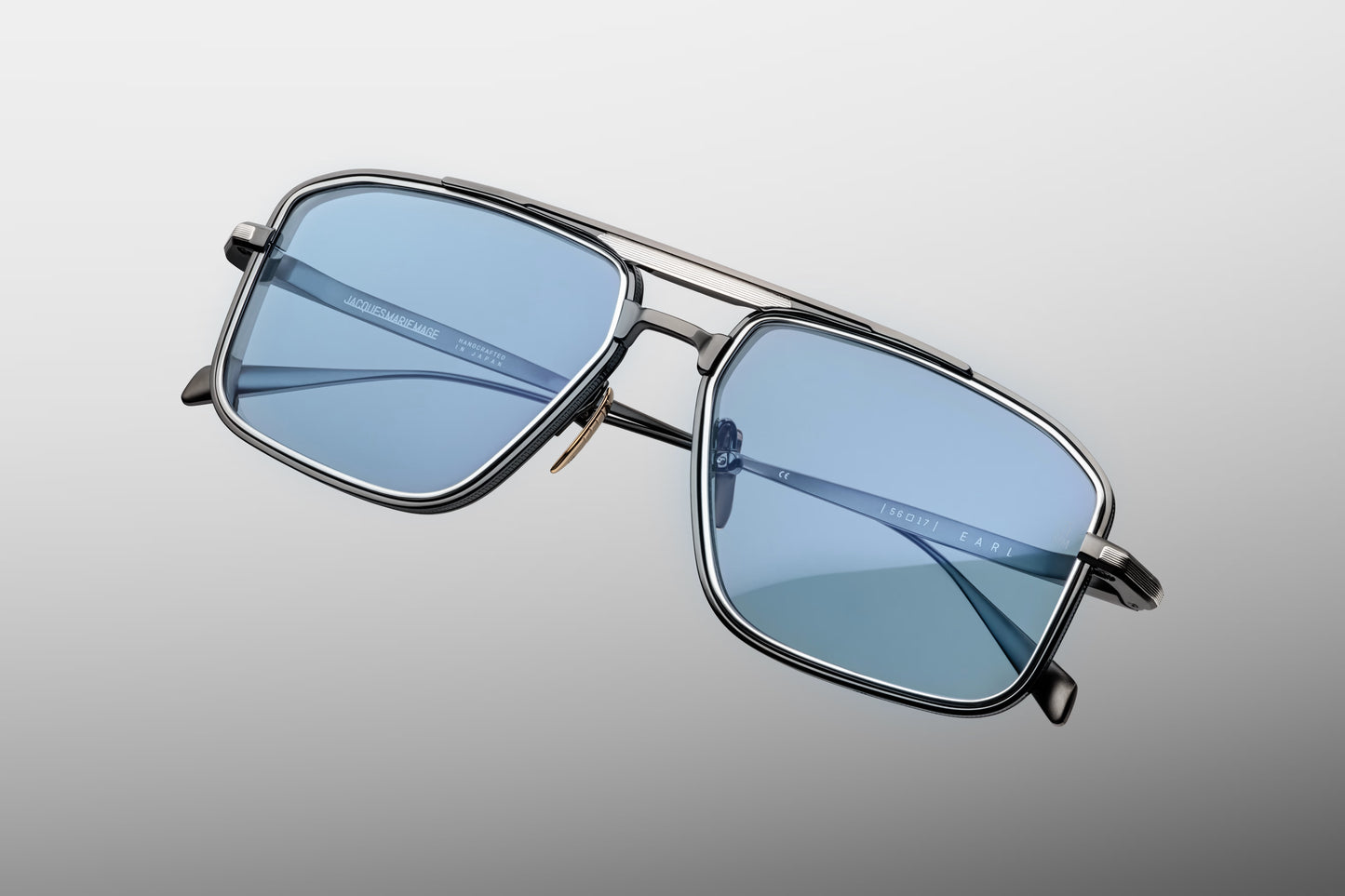 Top view of Jacques Marie Mage Earl Antique Silver sunglasses showcasing double bridge navigator design, titanium construction and Art Deco detai