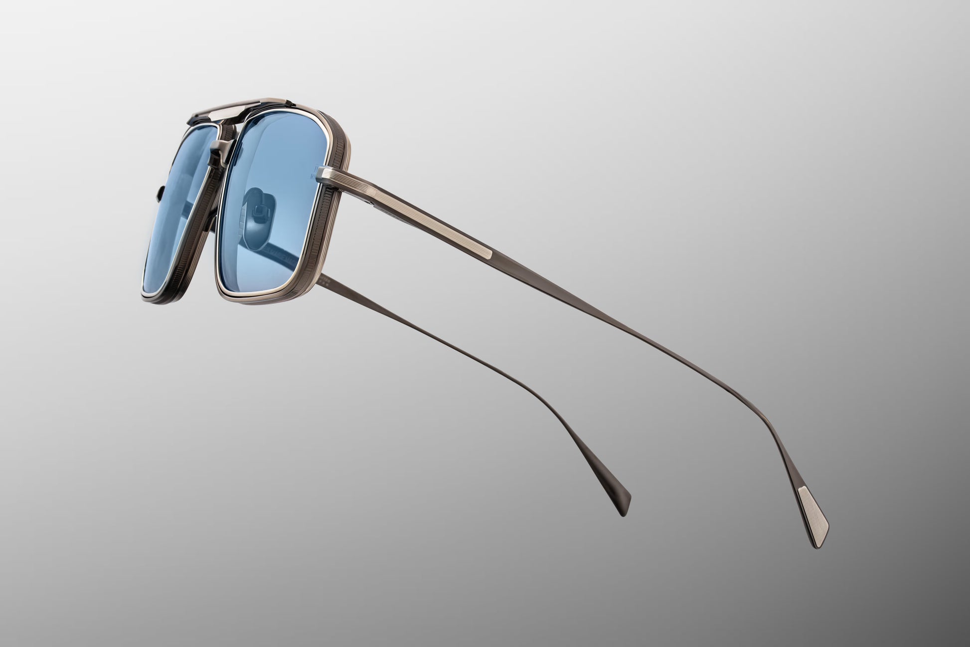 Jacques Marie Mage Earl Antique Silver sunglasses close up of temple with engraved titanium, custom hardware and signature Art Deco embellishments