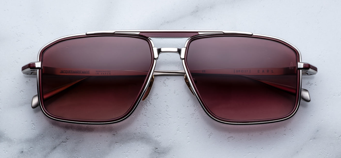 Front view of Jacques Marie Mage Earl Bordeaux — ’70s titanium navigator sunglasses with bordeaux titanium eyerim inserts, dark-gold beta titanium frame, and mahogany gradient CR‑39 lenses with AR coating