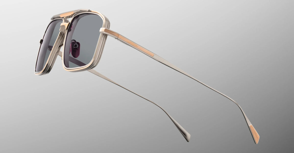 Side view of Jacques Marie Mage Earl sunglasses, showcasing the detailed rose gold beta titanium temples, engraved custom hairline filigree, and signature wing tips.
