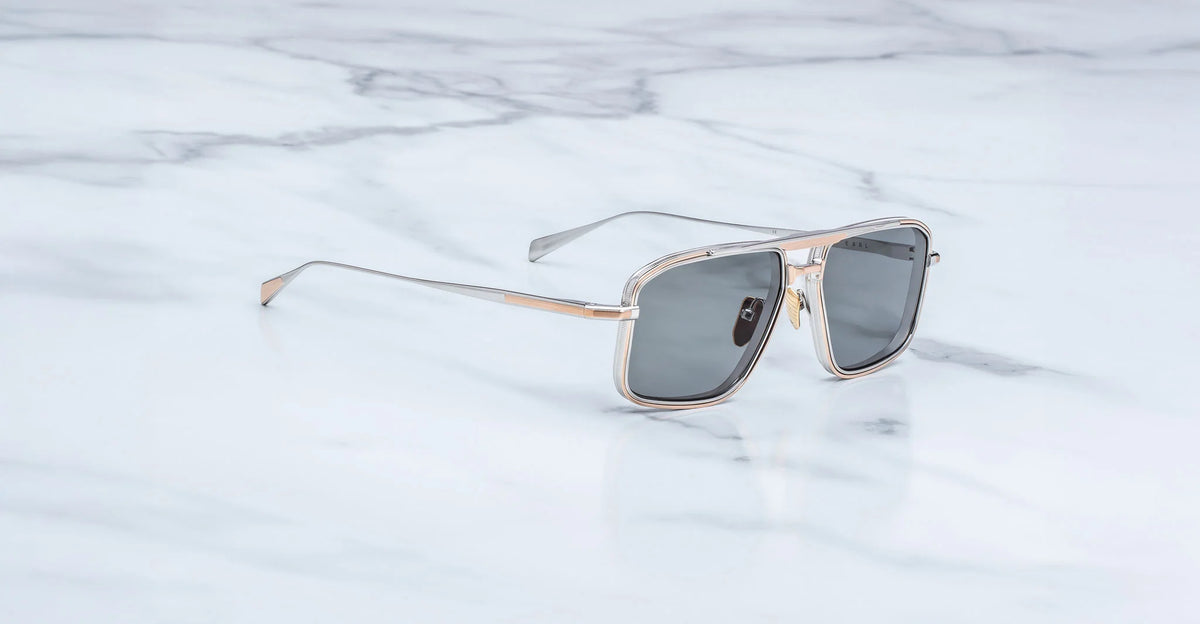 Side view of Jacques Marie Mage Earl sunglasses, showcasing the detailed rose gold beta titanium temples, engraved custom hairline filigree, and signature wing tips.