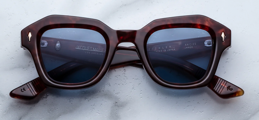 Jacques Marie Mage Eichler Breccia sunglasses front view, geometric small-fit frame in brown havana acetate with sculptural 60s silhouette
Front view of JMM Eichler Breccia eyeglasses, architectural rectangular frame in warm brown acetate with gold arrowhead rivets