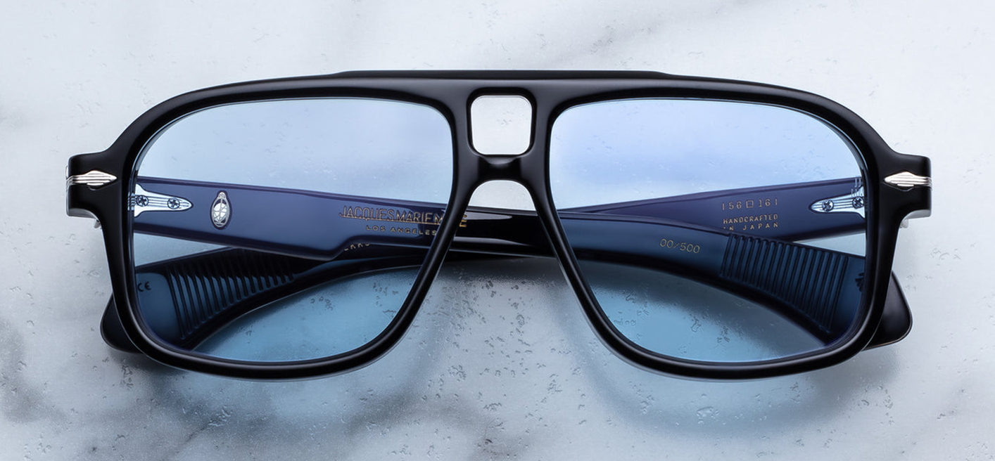 Jacques Marie Mage Elkhart Obscure sunglasses front view with sculptural navigator frame and blue lenses – available at WINK Optometrists.