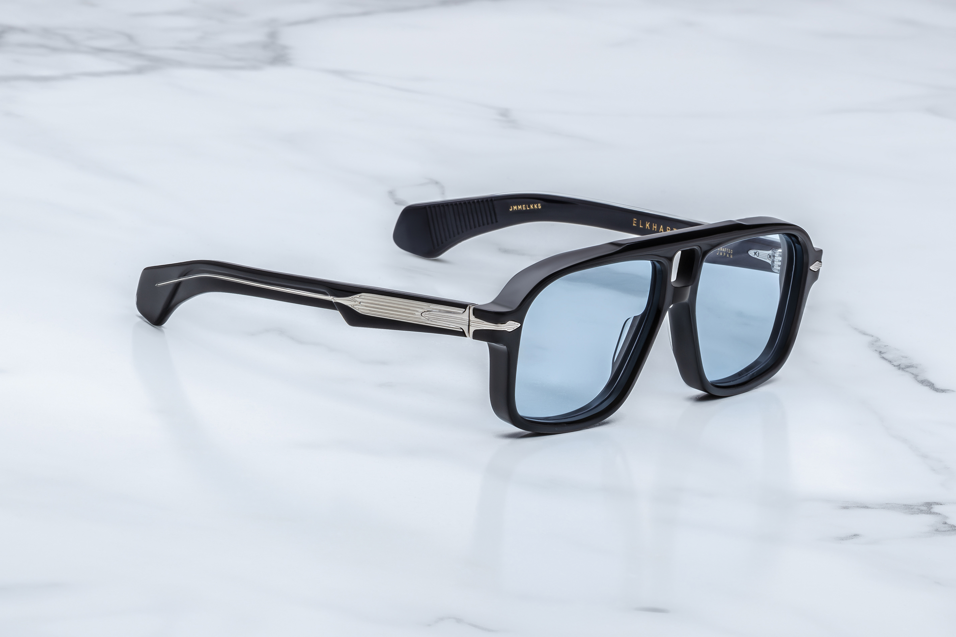 Jacques Marie Mage Elkhart Obscure sunglasses three-quarter angle highlighting bold acetate construction and architectural navigator silhouette – available at WINK Optometrists.