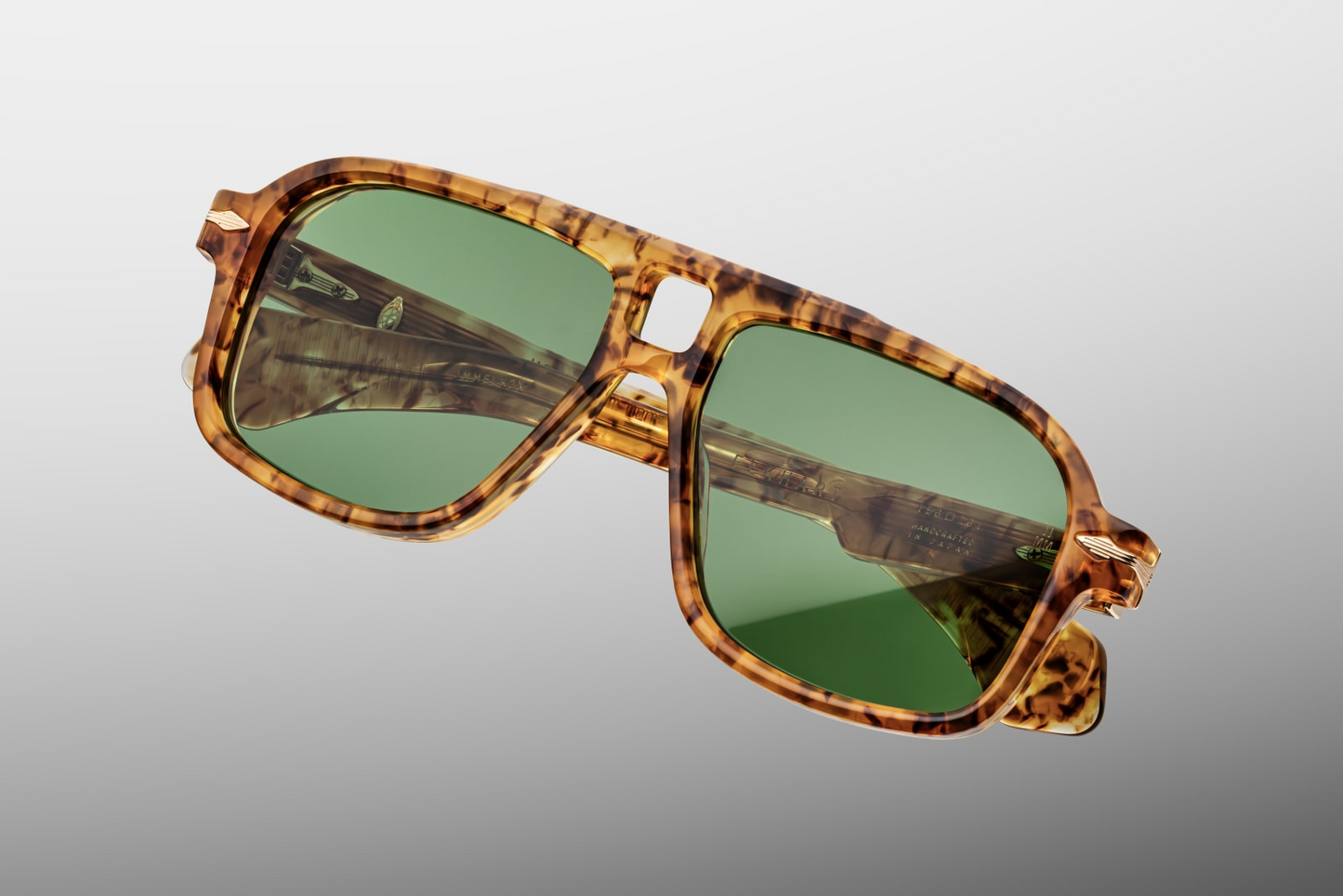Top view of Jacques Marie Mage Elkhart Vintage Tort sunglasses showcasing sculptural brow ridge and bold navigator frame design – available at WINK Optometrists.