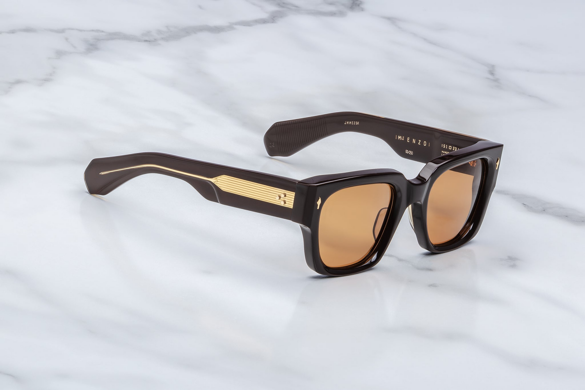 Side view of Jacques Marie Mage Enzo (Walnut) — walnut-brown double-laminated acetate temple featuring dark gold hardware, exposed wire-core detail and 7-barrel hinge