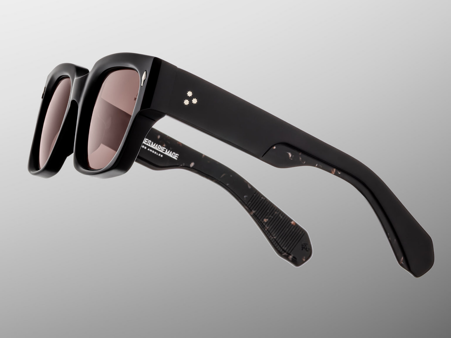 Temple detail of Jacques Marie Mage Enzo (Willow) — focuses on acetate double‑laminated temple, engraved hidden wire‑core, and custom 7‑barrel hinge hardware