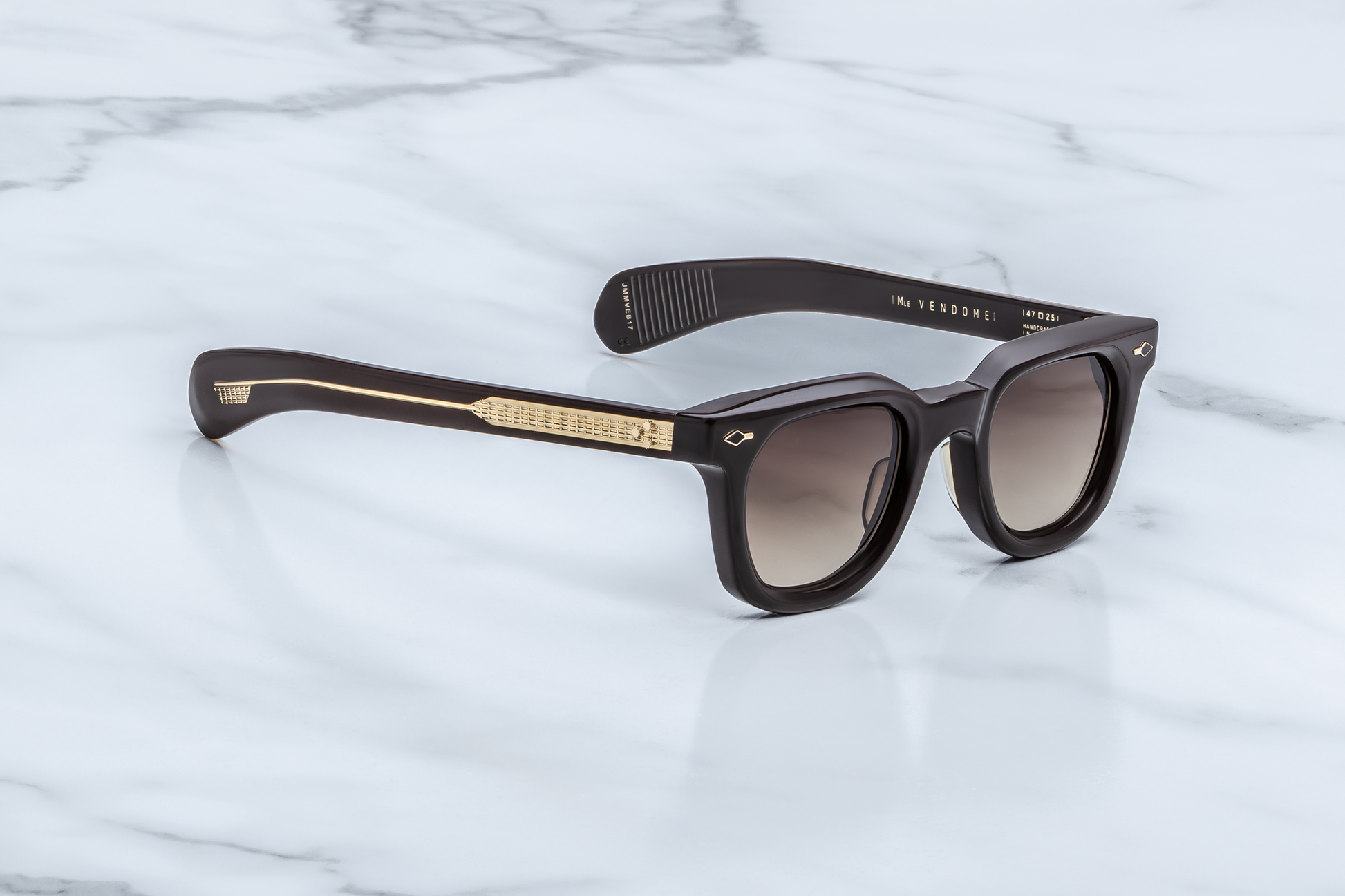 Profile of Vendome Grenache — double-laminated grenache acetate paddle temples showing exposed sterling silver wire-core