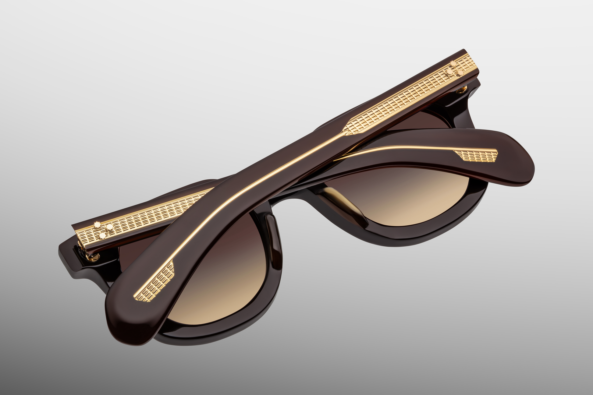 Rear view of Vendome Grenache — inside of the temples revealing the grenache interior laminate and partially visible silver wire-core