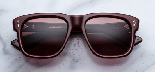 JMM Epoxy II Yves in Cassis — rectangular Wellington-style frame in deep burgundy-cassis acetate with ruby CR‑39 lenses and hand-painted cassis epoxy arrowhead pins