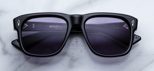 Jacques Marie Mage Epoxy II Yves Fumée — Wellington-style frame in polished black acetate with hand-painted black epoxy arrowhead front pins and Nimbus grey lenses.