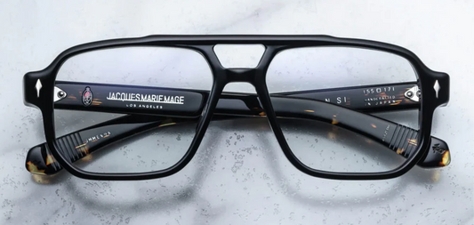 Front view of Jacques Marie Mage Evans Noir 15 optical glasses with bold black 8 mm cured acetate rectangular frames, signature double-nose bridge and precision precious metal hardware — luxury handcrafted Japanese eyewear