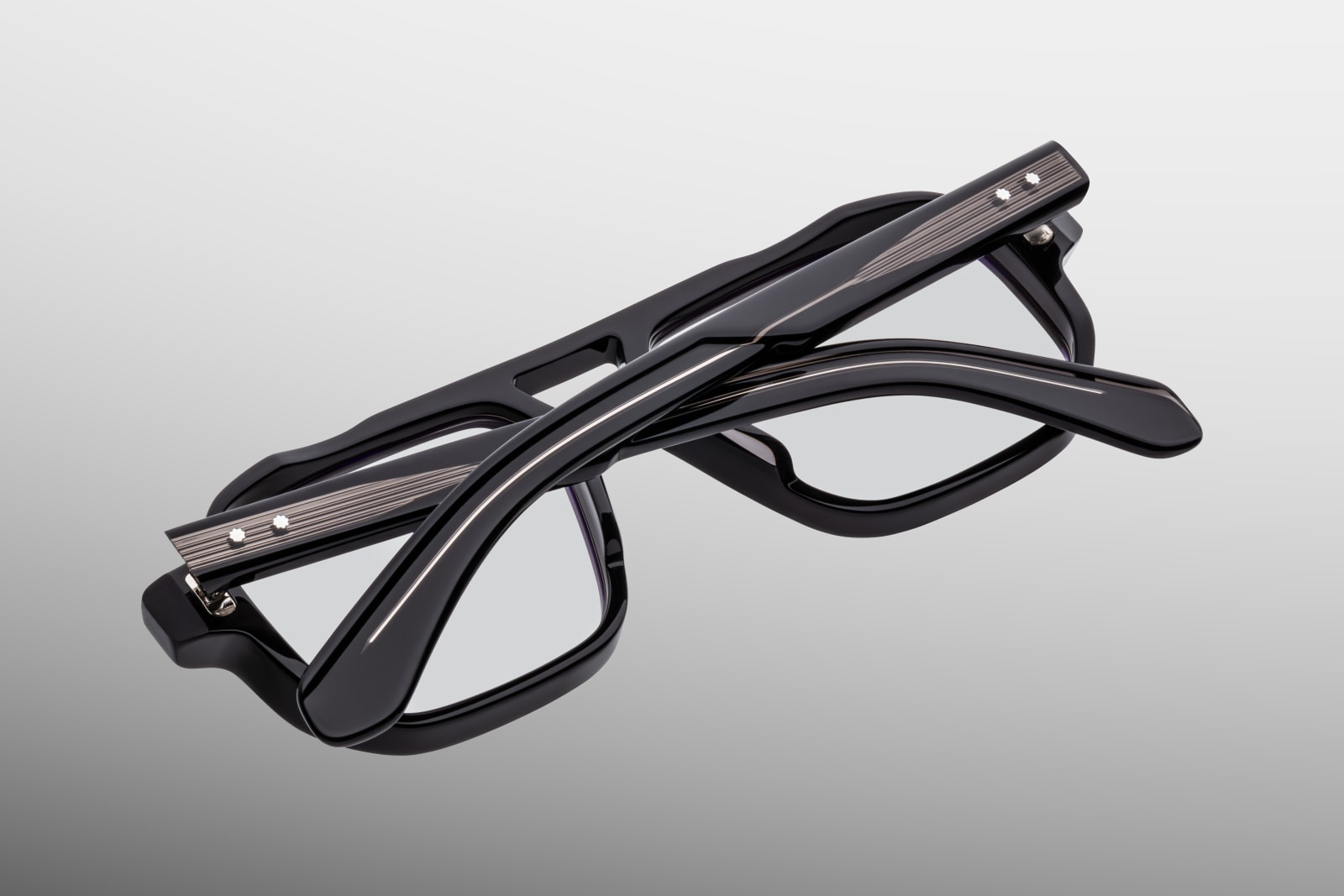 Rear view of Jacques Marie Mage Evans Raven eyeglasses showing clean acetate rims, inner double‑nose‑bridge structure, visible exposed wirecore, and limited‑edition batch numbering of 500 pieces
