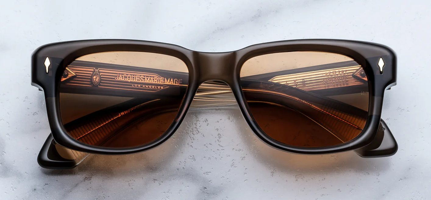 Jacques Marie Mage Jeff Goldblum Fly London sunglasses front view, rounded rectangular acetate frame in brown with sculpted brow and tinted lenses
Front view of JMM Fly London sunglasses, vintage-inspired D-frame acetate with bold bevelled brow and warm brown tones