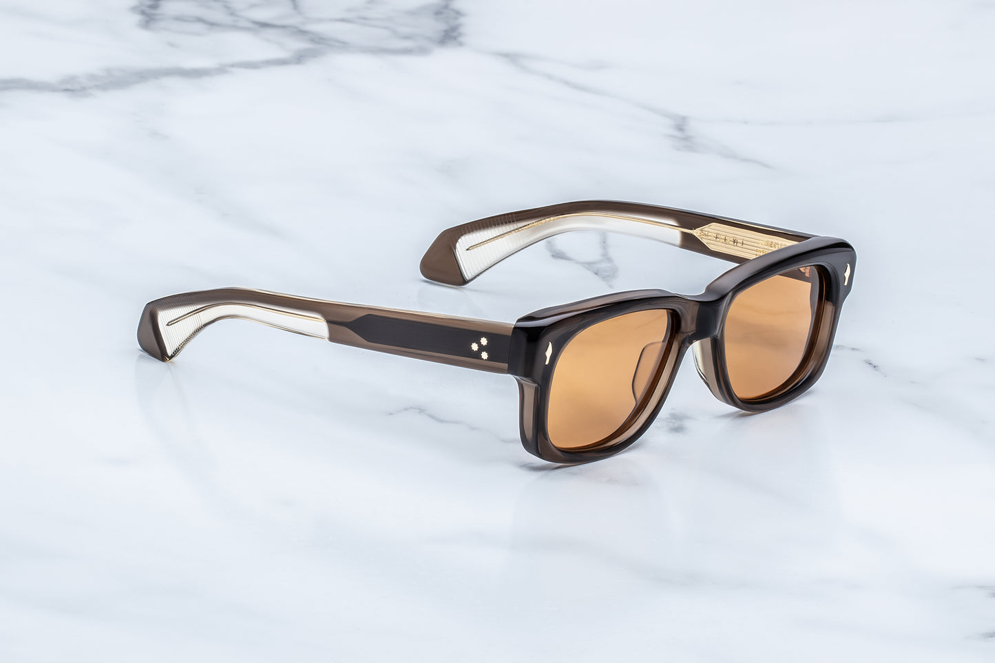 Jacques Marie Mage Fly London side view showing thick acetate temples, exposed wire core and sculpted profile
Side profile of JMM Jeff Goldblum Fly London sunglasses highlighting layered acetate temples and premium hardware