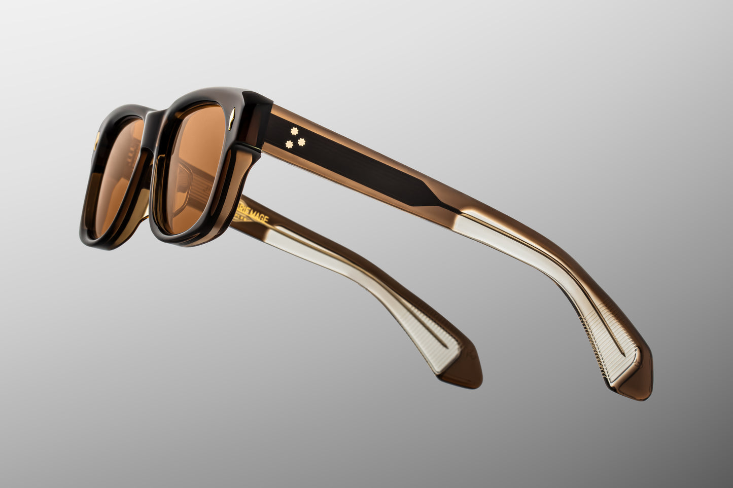 Close-up back view of Jacques Marie Mage Fly London sunglasses showing inner temple engraving and exposed wire core
Rear detail of JMM Fly London frame revealing handcrafted acetate interior and limited edition serial number
