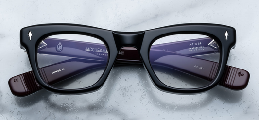 Front view of Jacques Marie Mage Godard eyeglasses in bloodstone acetate, featuring a bold rectangular silhouette