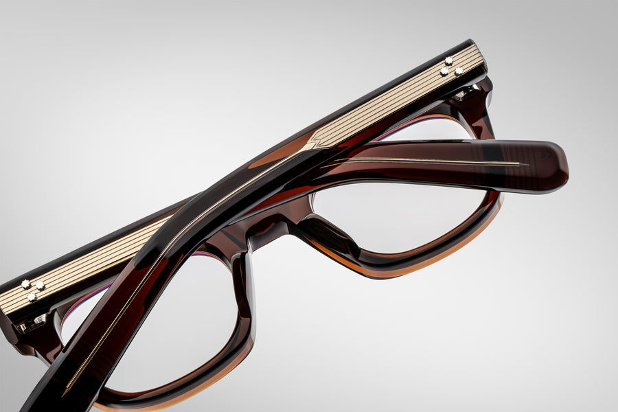 Three-quarter angle of the Godard in Zoltar — highlighting the sculptural depth of the acetate, the shaping of the front and side profile, and the warmth of the super-light brown CR39 lenses