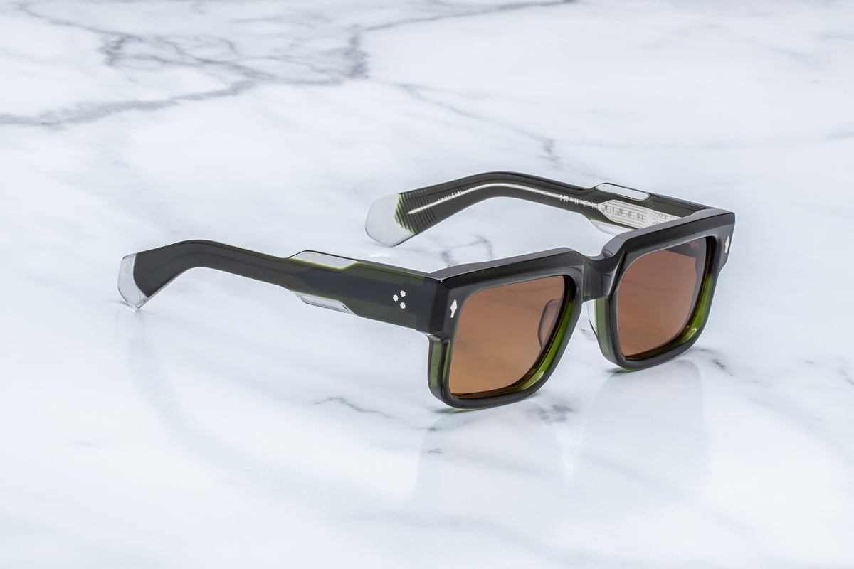 Three-quarter view of the Jacques Marie Mage Hemmings Borneo frame. Highlights the prominent architectural beveling along the frame's brow line and the heavy transition into thick, sculptural temple arms.
WINK OPTOMETRISTS