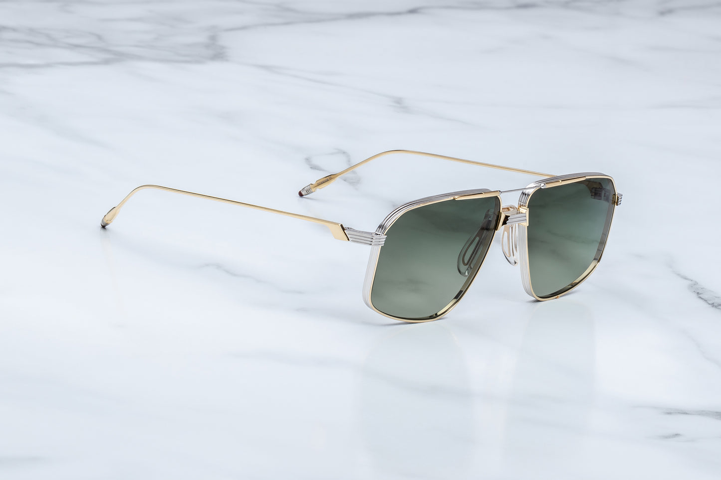 Jacques Marie Mage Jagger Musket side view showing beta titanium temples, engraved details and slim aviator profile
Side profile of JMM Jagger Musket sunglasses highlighting lightweight titanium construction and temple tips