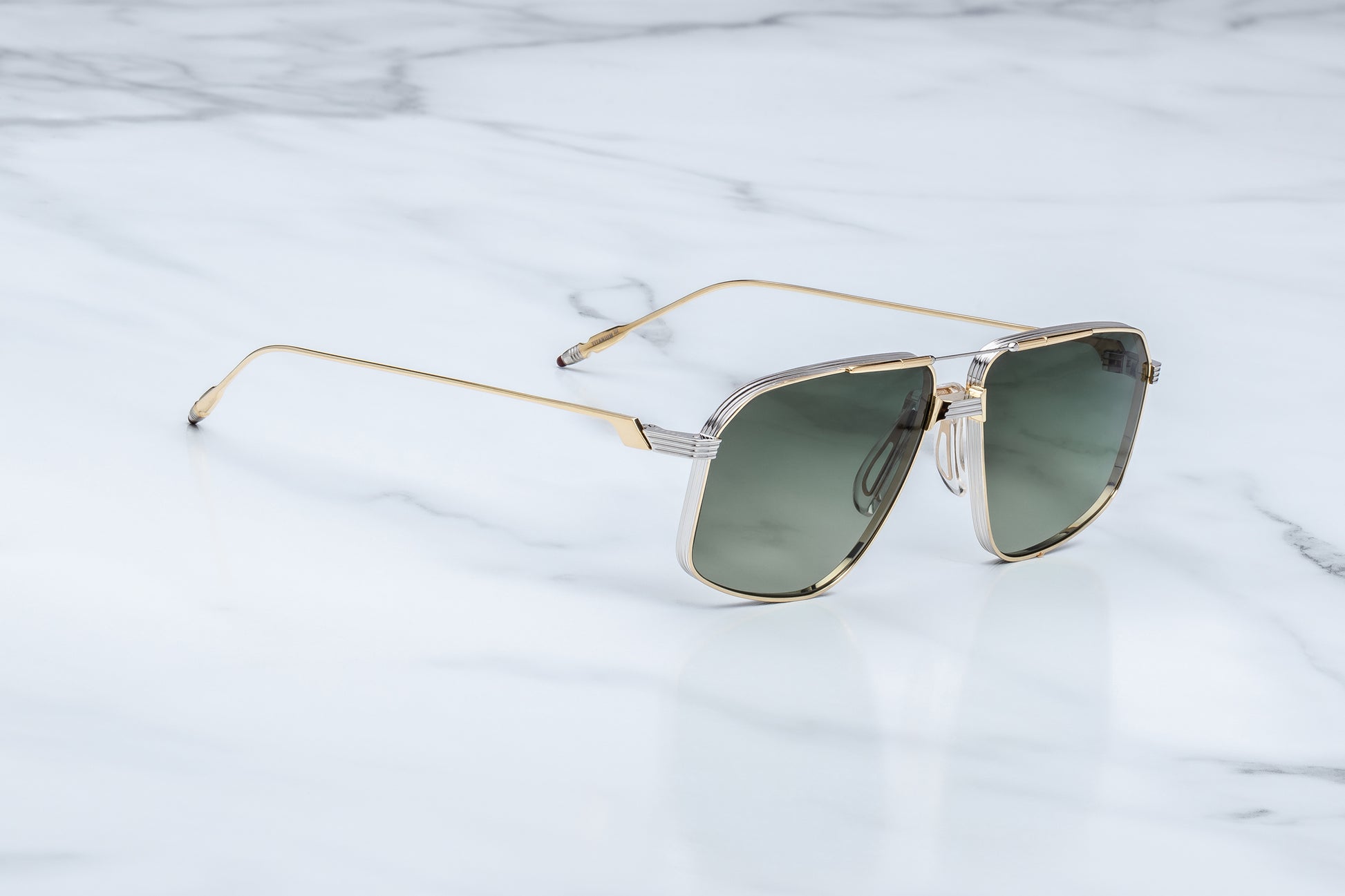 Jacques Marie Mage Jagger Musket side view showing beta titanium temples, engraved details and slim aviator profile
Side profile of JMM Jagger Musket sunglasses highlighting lightweight titanium construction and temple tips
