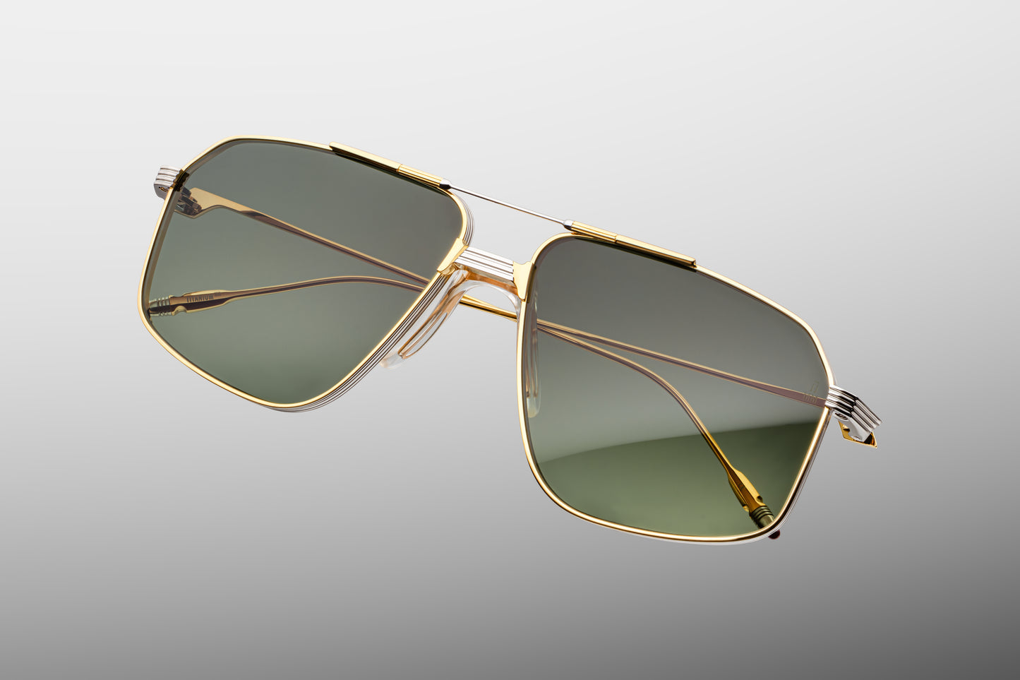 Close-up front detail of Jacques Marie Mage Jagger Musket frame showing sculptural bridge, brow bar and premium lens finish
Macro front view of JMM Jagger Musket aviators highlighting Art Deco bridge design and titanium craftsmanship