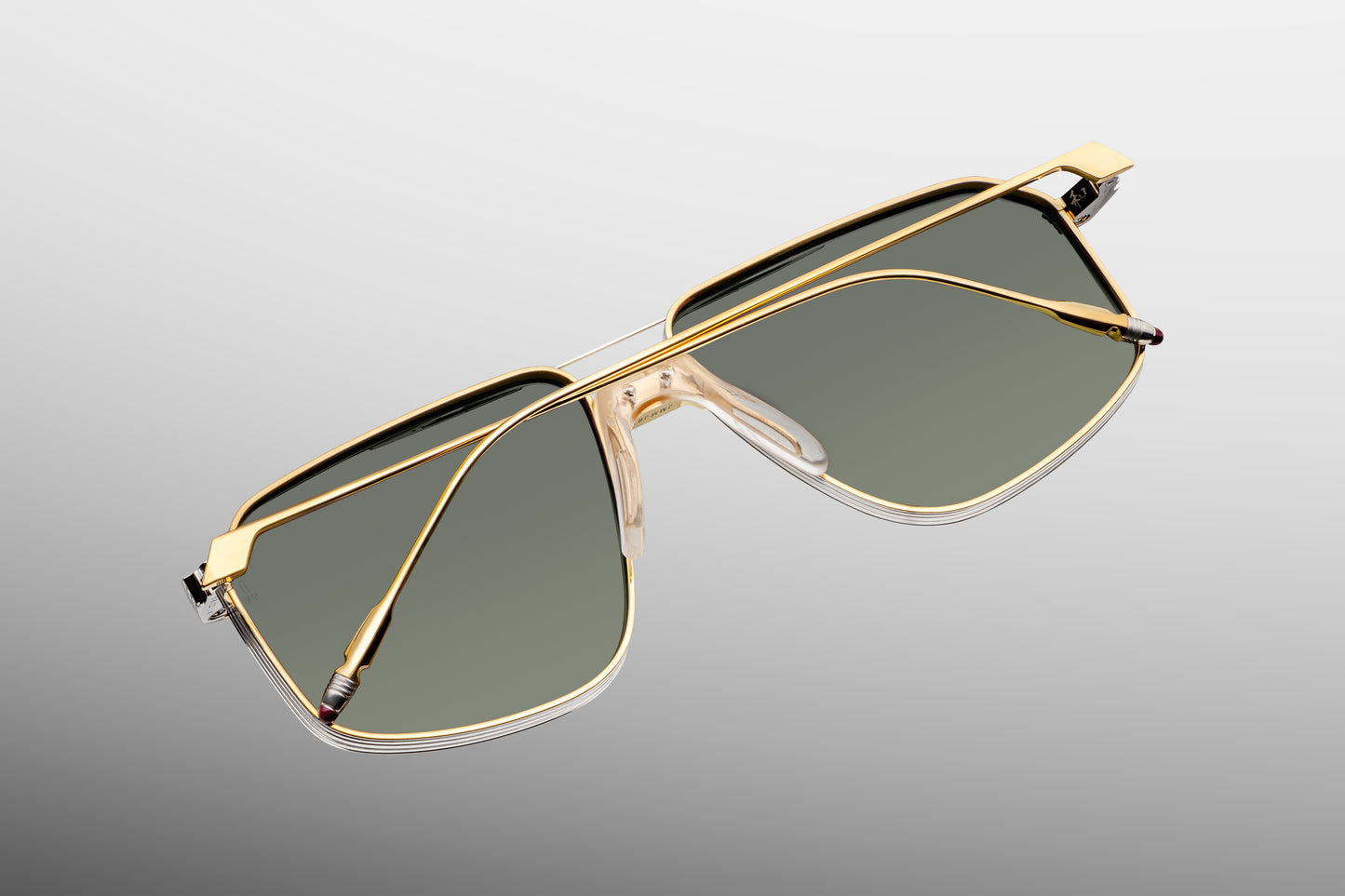 Close-up back view of Jacques Marie Mage Jagger Musket sunglasses showing inner temple engraving and limited edition serial number
Rear detail of JMM Jagger Musket frame revealing handcrafted titanium structure and signature branding