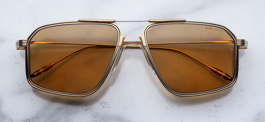 Front view of Jacques Marie Mage Hagger sunglasses from the Decade Collection Roma, showcasing the bold, rectangular acetate frame with a vintage-inspired design