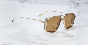 Side view of the Jacques Marie Mage Hagger Roma sunglasses, highlighting the sculpted temple arms, signature arrowhead rivets, and engraved metal core