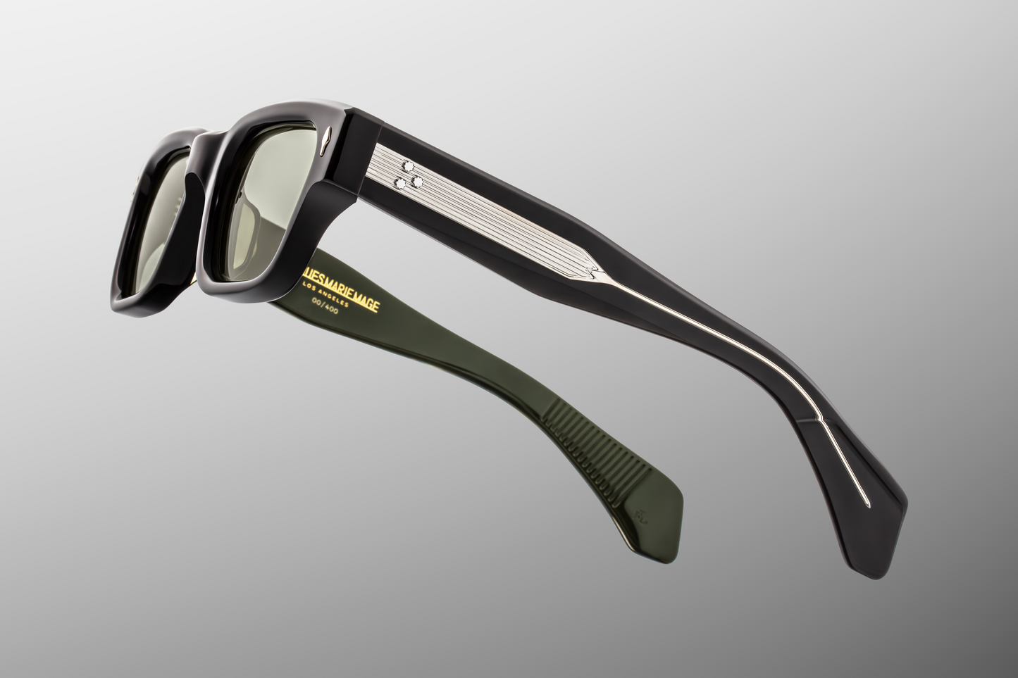 Side profile of Jacques Marie Mage Jeff Cobra sunglasses showing thick acetate temples and signature arrowhead rivets – available at WINK Optometrists.