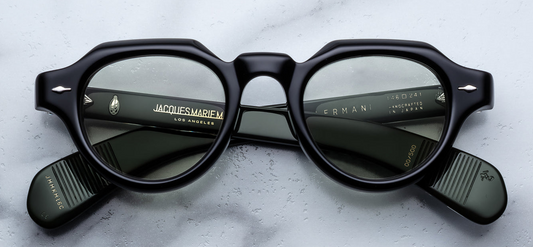 Front of the Kellerman Cobra — glossy black panto-shaped acetate frame with a keyhole bridge and light bottle green CR39 lenses