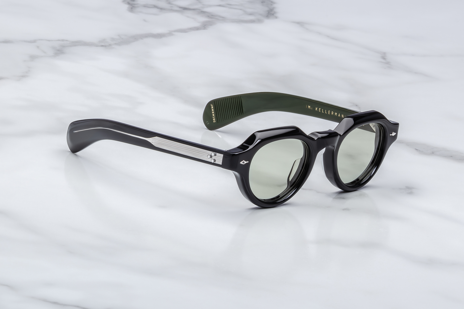 Right temple of the Kellerman Cobra — black double-laminated acetate with exposed silver wire-core and a paddle-style temple tip