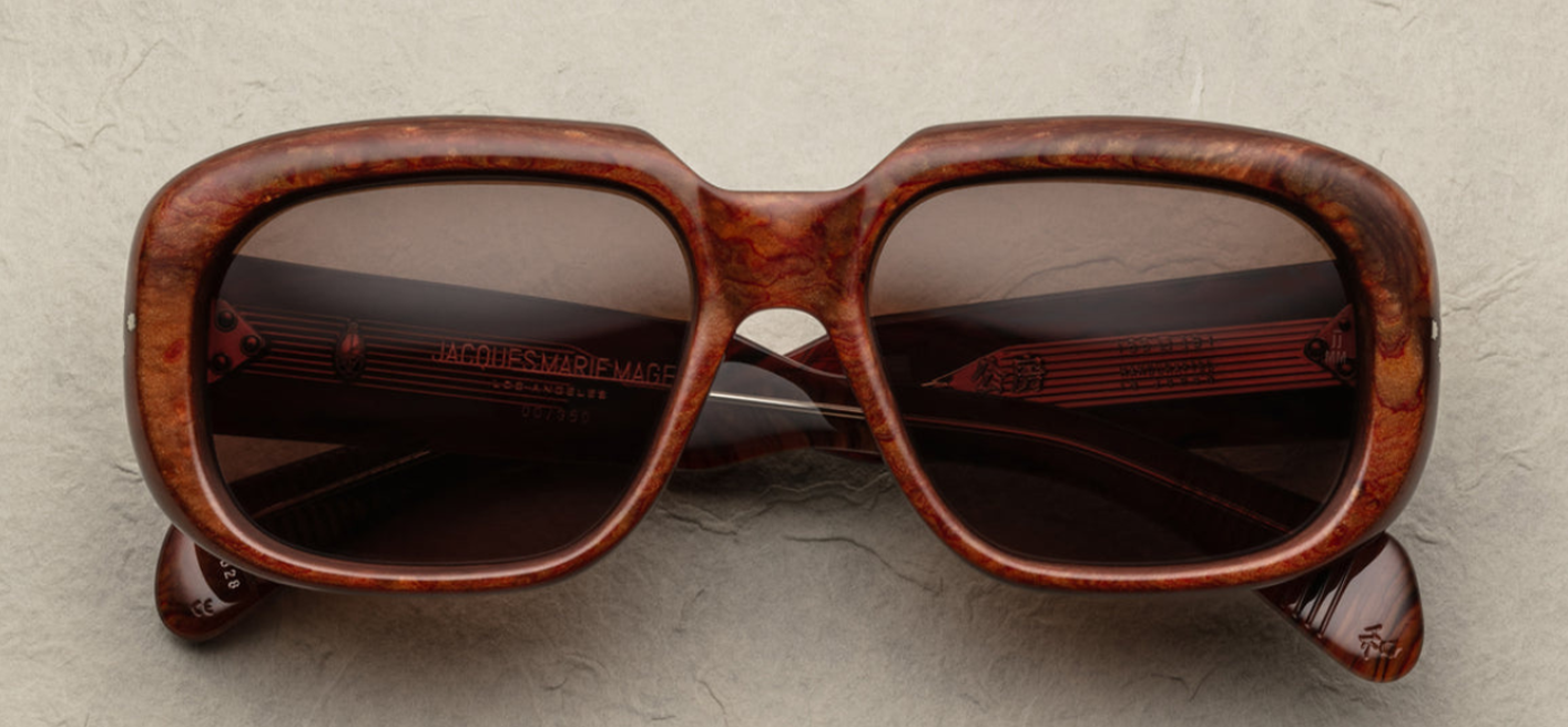 Close-up of the front of Kobo Burlwood sunglasses by Jacques Marie Mage, highlighting the unique frame design featuring 9 barrel hinge and Exposed inner temple wire core