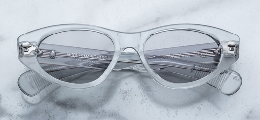 Front view of Jacques Marie Mage Krasner sunglasses in Sulfur — luxury cat-eye designer sunglasses with bold yellow acetate frame and dark lenses.