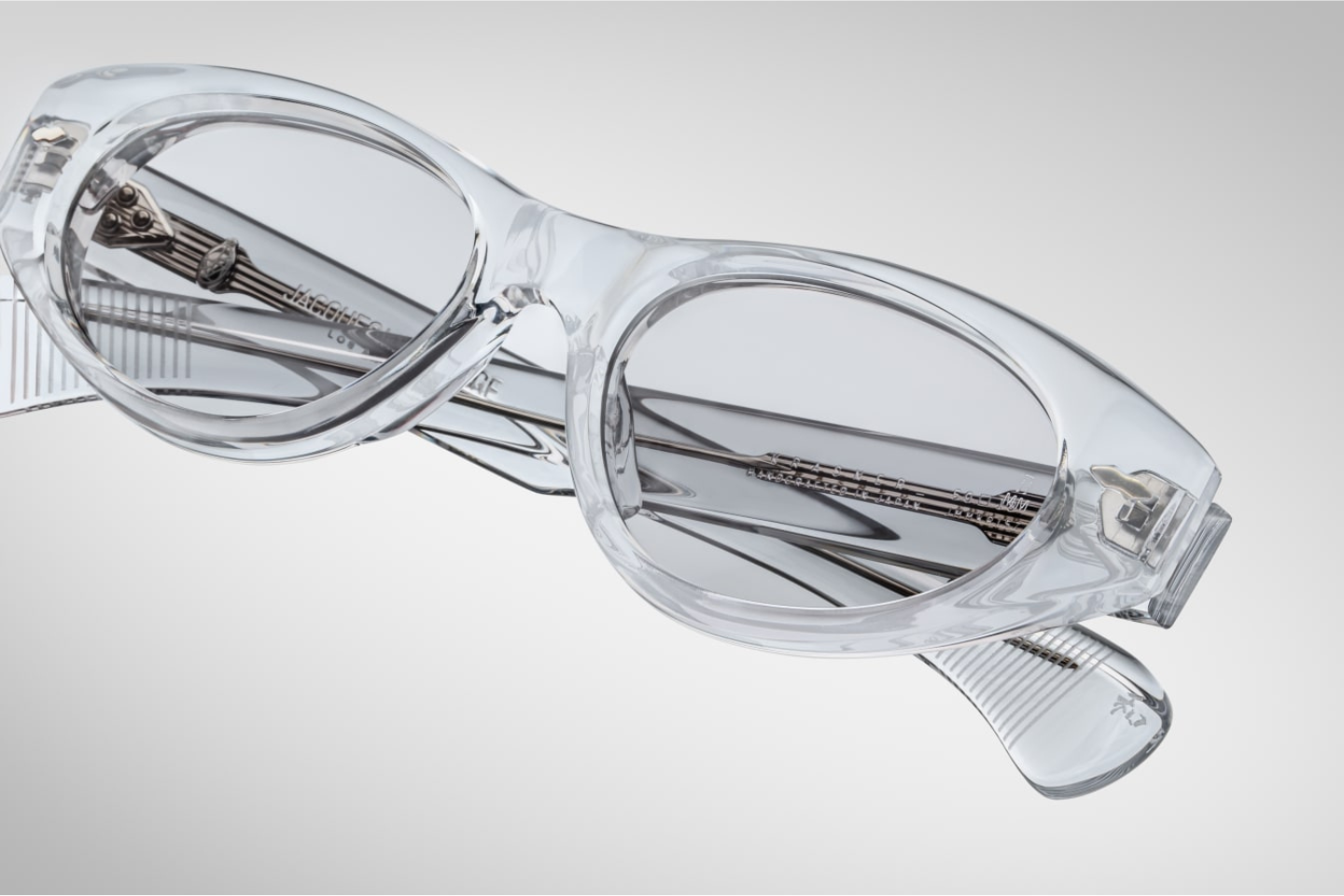 Top view of Jacques Marie Mage Krasner Sulfur sunglasses showcasing wide cat-eye silhouette and polished luxury eyewear finish
