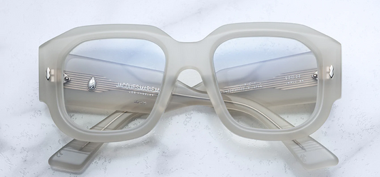 Front view of Jacques Marie Mage Lacy sunglasses in dune acetate, featuring an oversized square frame and brown lenses