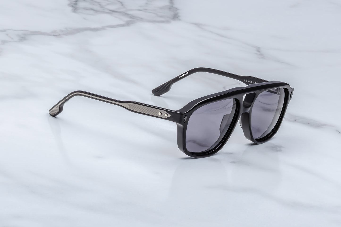 Jacques Marie Mage Leonard Raven sunglasses side profile showcasing sleek black acetate temples, slim silhouette and luxury Japanese craftsmanship