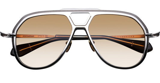 THE JACQUES MARIE MAGE LOCKHEED AUTUMN SILVER 100% BETA TITANIUM AVIATOR SUNGLASSES WITH 
SILVER ENGRAVED TITANIUM TEMPLES AND CUSTOM NOSE PADS WITH LOGO AND HAIRLINE ENGRAVING
BROWN TRI GRADIENT CR39 4 BASE LENS WITH BACKSIDE ANTI-REFLECTIVE TREATMENT
100% UV PROTECTION