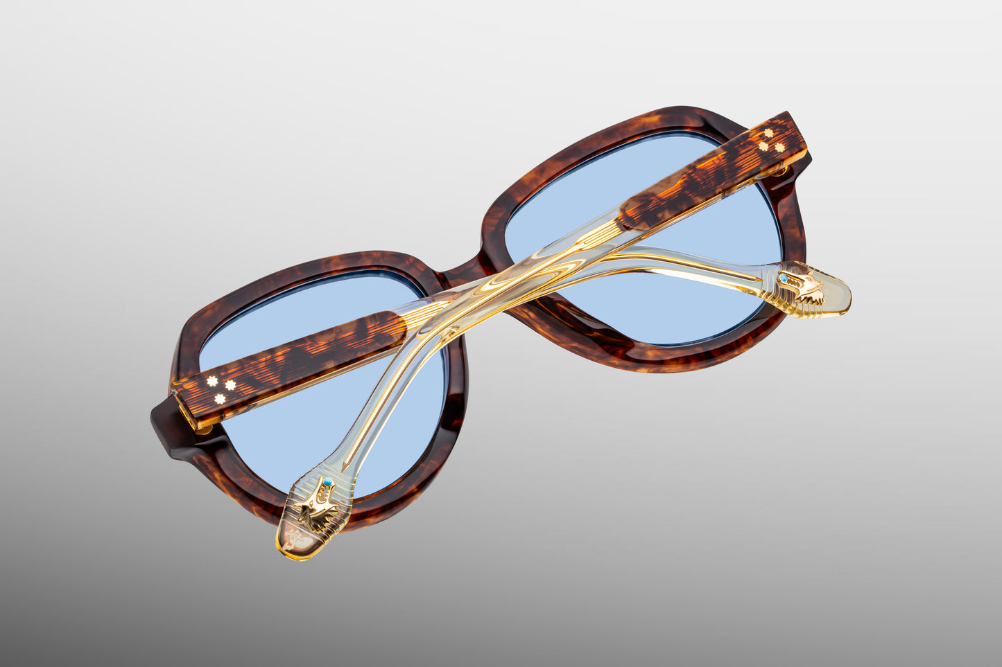 Close-up back view of Jacques Marie Mage Louise Paris sunglasses showing inner temple engraving and exposed wirecore structure
Rear detail of JMM Louise Paris frame revealing handcrafted acetate interior and limited edition markings