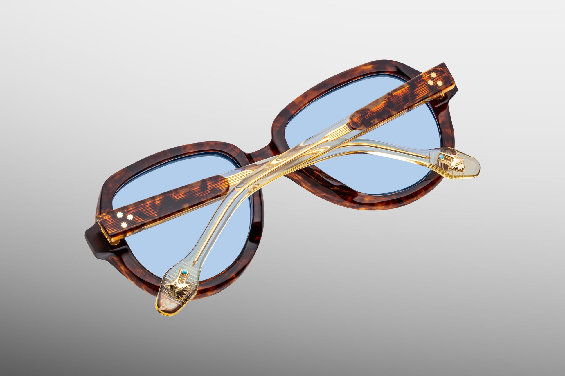 Close-up back view of Jacques Marie Mage Louise Paris sunglasses showing inner temple engraving and exposed wirecore structure
Rear detail of JMM Louise Paris frame revealing handcrafted acetate interior and limited edition markings