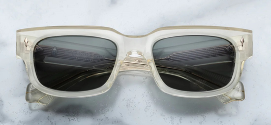 eyeglasses by Jacques Marie Mage Mattei in Brut with crystal 10mm cured cellulose acetate frame with custom double laminated acetate temples featuring precious metal hardware and green lenses. Available at WINK Optometrists.