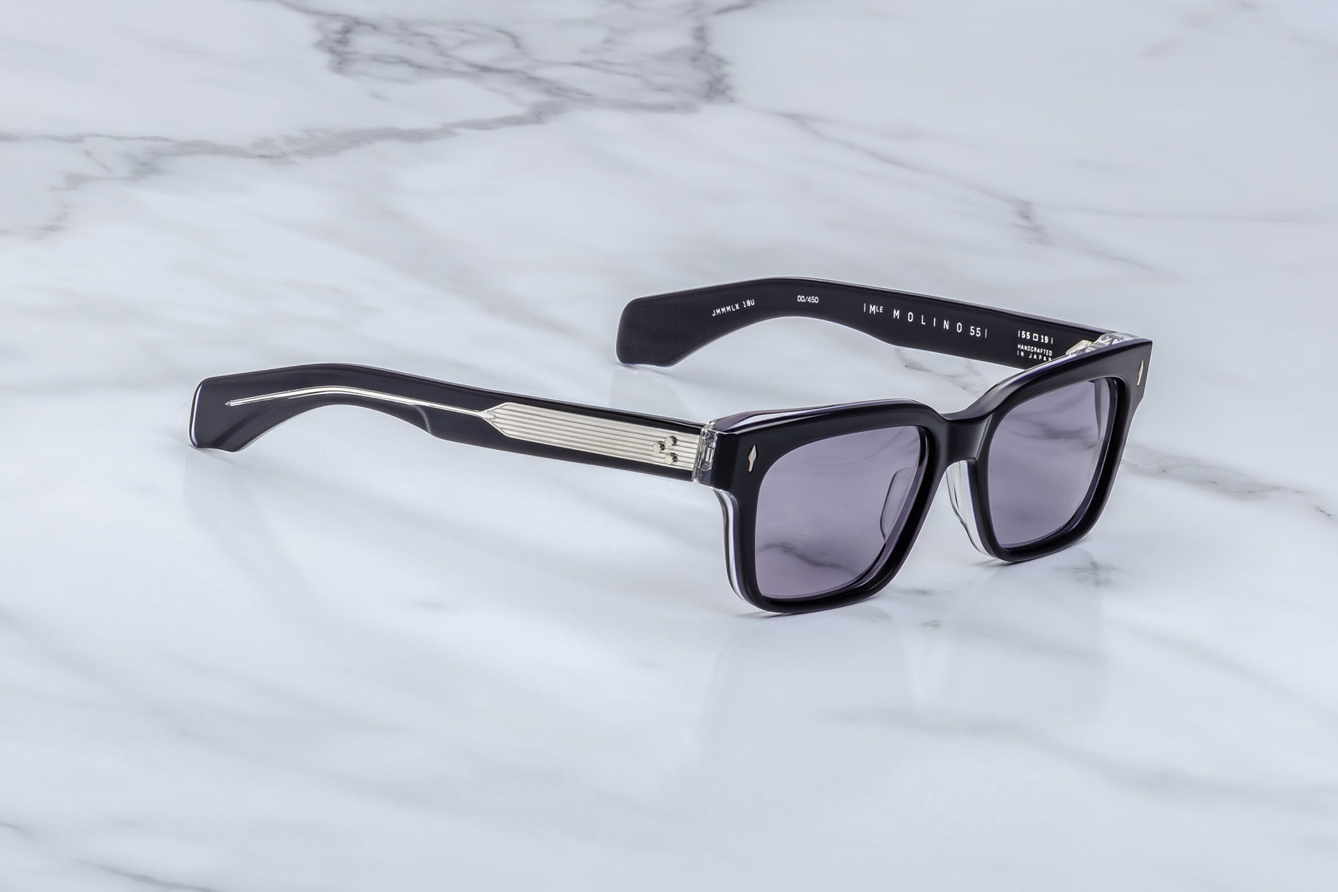 Jacques Marie Mage Molino Hudson side view showing thick acetate temples, exposed silver wire core and sculpted profile
Side profile of JMM Molino Hudson sunglasses highlighting layered acetate temples and premium hinge hardware
