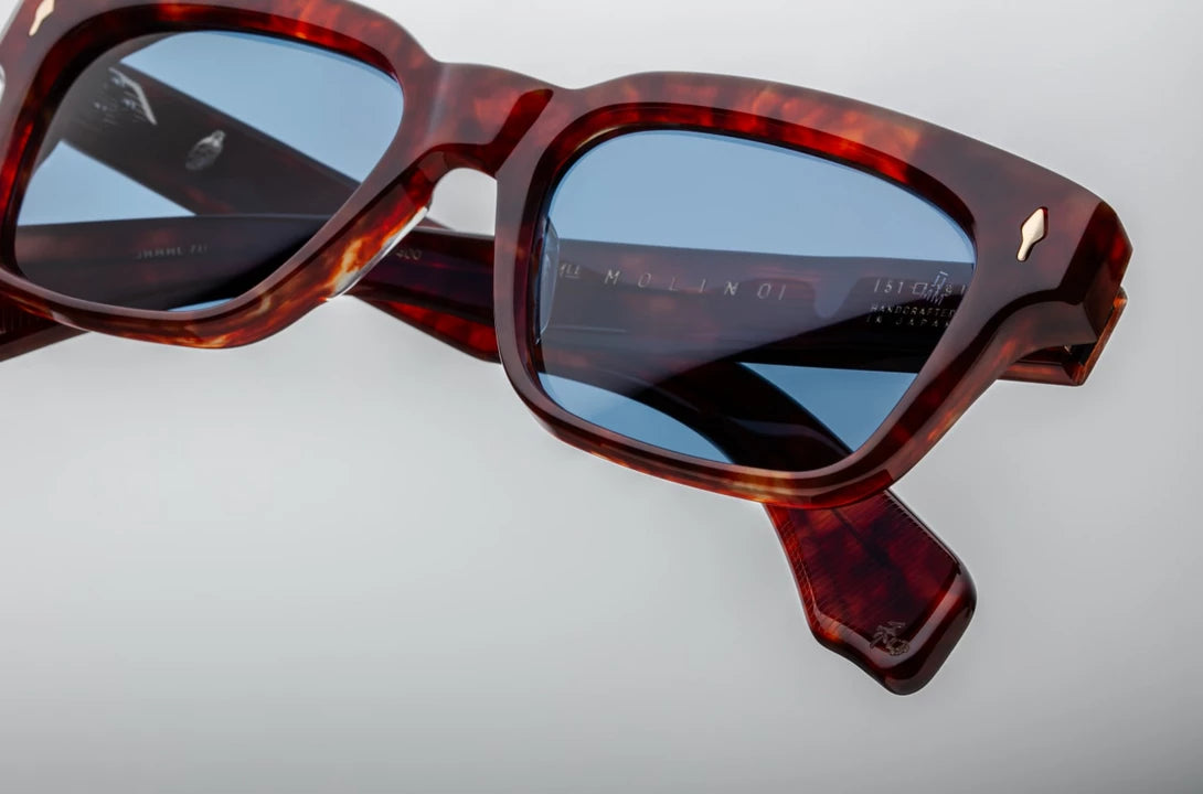 Top-down view of the JMM Molino 51 Breccia sunglasses, revealing the frame's angular geometry, the substantial 10mm thick acetate brow line, and heavy-duty 7-barrel hinges finished in light gold