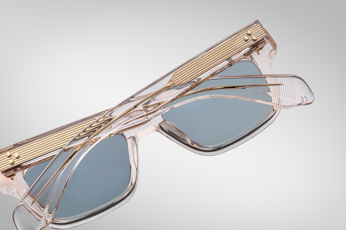 Interior of the Molino Cameo — polished inside of the translucent acetate, visible gold wire-core in the temples, and the engraved limited-edition serial number on the temple